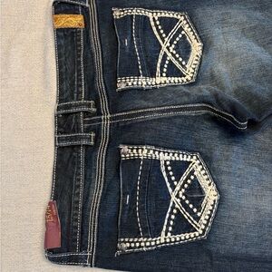 Maurices Dark Blue Boot Cut Jeans with Embroidered Pockets